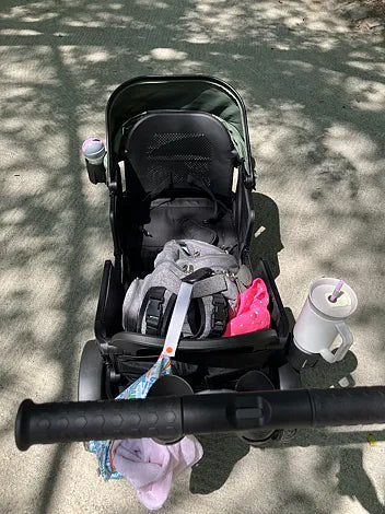 Parent’s view of a green Waggle wagon carrying bags and drinks